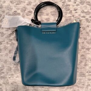 NWT Trina Turk sold out teal color bucket bag